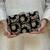 Black silk metallic clutch