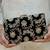 Black silk metallic clutch