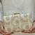 Beige silk metallic clutch