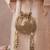 Gold textured gota satin potli bag