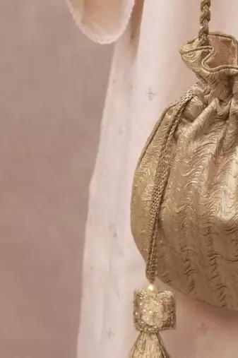 Gold textured gota satin potli bag