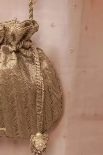 Gold textured gota satin potli bag