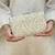 Beige tissue suede clutch