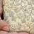 Beige tissue suede clutch