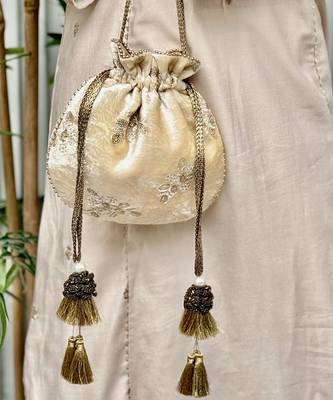 Off white velvet suede potli bag 1