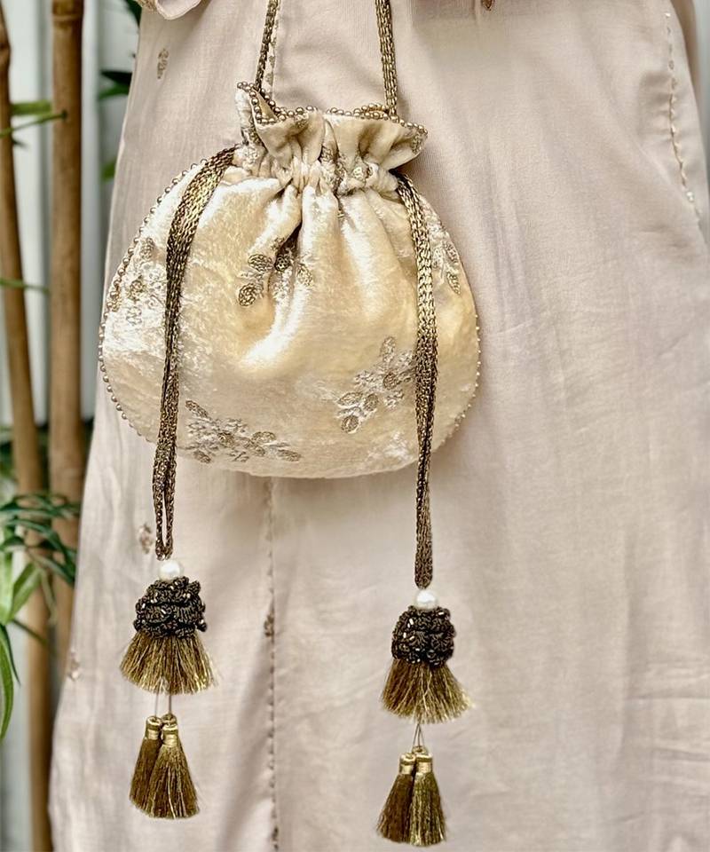 Off white velvet suede potli bag