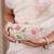 Multicolor floral embroidered clutch