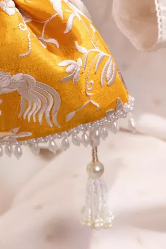 Mustard yellow pure raw silk potli bag