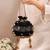 Black semi tissue potli bag
