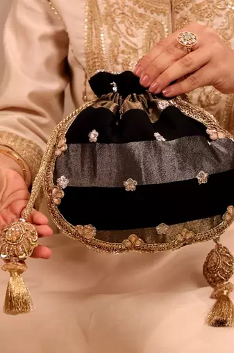 Black semi tissue potli bag