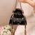 Black semi tissue potli bag
