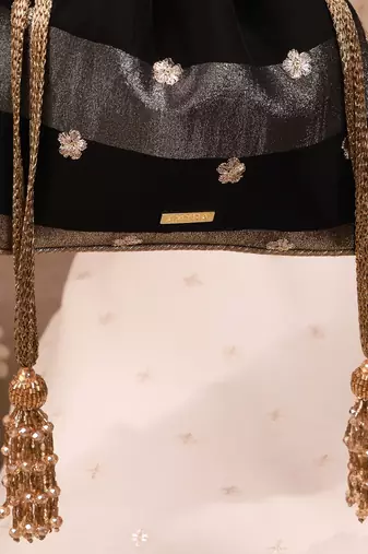 Black semi tissue potli bag