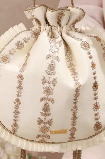 Off white embroidered poly silk potli bag