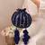 Navy blue embroidered poly silk potli bag