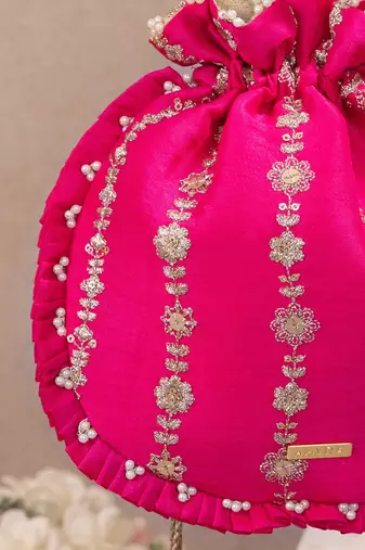 Pink embroidered poly silk potli bag
