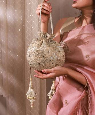 Gold tissue cutwork mirror synthetic potli bag 1