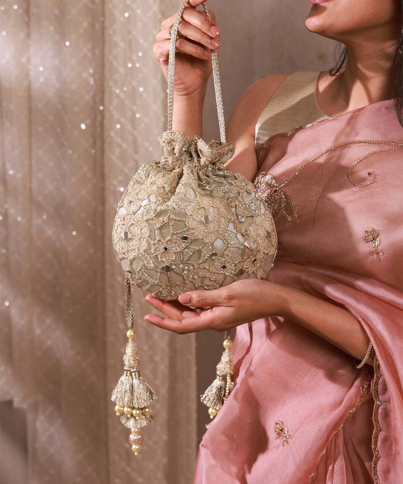 Gold tissue cutwork mirror synthetic potli bag