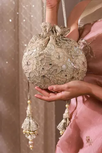 Gold tissue cutwork mirror synthetic potli bag