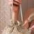 Gold tissue cutwork mirror synthetic potli bag
