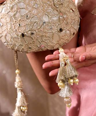 Gold tissue cutwork mirror synthetic potli bag 5