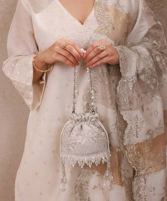 Silver hand embroidered silk potli bag 1