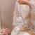Silver hand embroidered silk potli bag