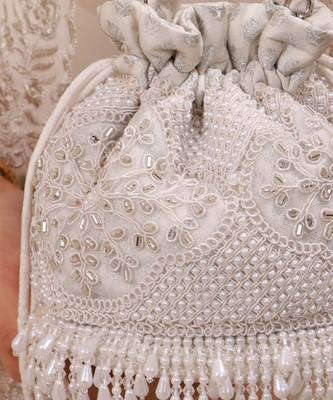 Silver hand embroidered silk potli bag 4