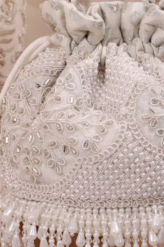 Silver hand embroidered silk potli bag
