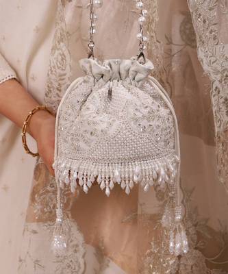 Silver hand embroidered silk potli bag 5