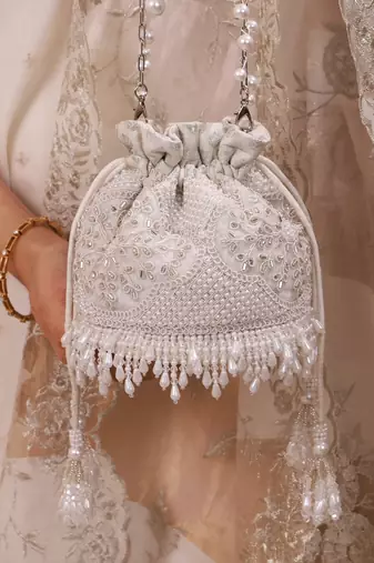 Silver hand embroidered silk potli bag