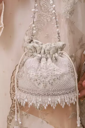 Silver hand embroidered silk potli bag