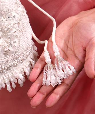 Silver hand embroidered silk potli bag 4
