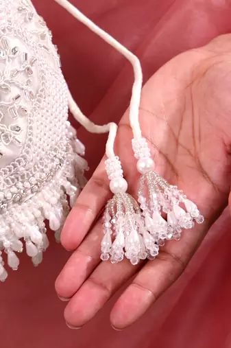 Silver hand embroidered silk potli bag