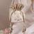 Beige woven silk satin potli bag