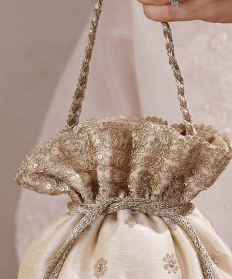 Beige woven silk satin potli bag 3