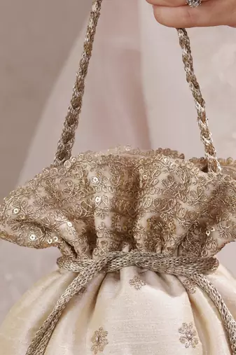 Beige woven silk satin potli bag