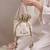 Beige woven silk satin potli bag
