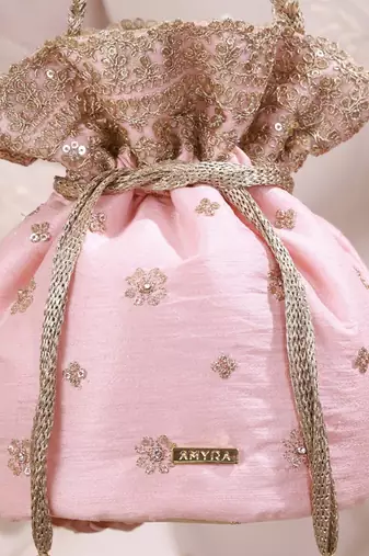 Peach pink woven silk satin potli bag