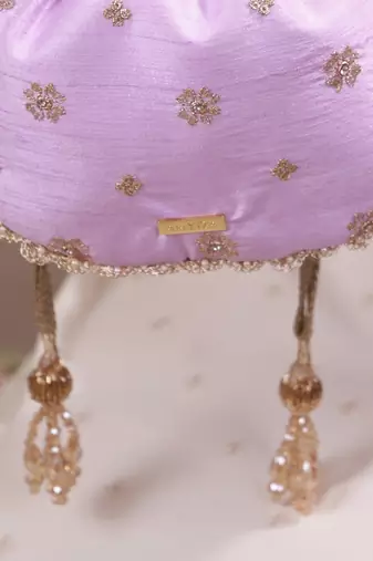 Lilac woven silk satin potli bag