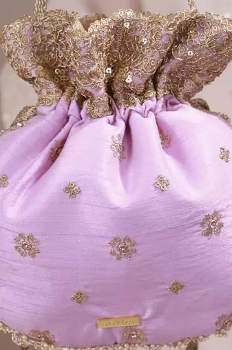 Lilac woven silk satin potli bag