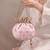 Peach pink woven silk satin potli bag