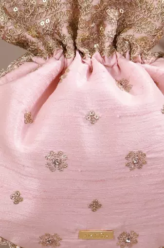 Peach pink woven silk satin potli bag