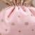 Peach pink woven silk satin potli bag
