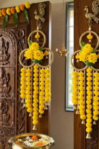 handmade yellow pompom floral ring hanging toran with bellsfestive hanging for home decor (pack of 2)