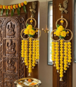 handmade yellow pompom floral ring hanging toran with bellsfestive hanging for home decor (pack of 2)