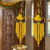 handmade yellow pompom floral ring hanging toran with bellsfestive hanging for home decor (pack of 2)