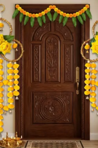 handmade yellow pompom floral ring hanging toran with bellsfestive hanging for home decor (pack of 2)