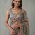Grey embroidered georgette saree with unstitched blouse