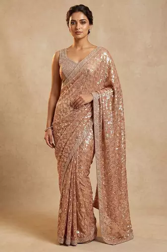 Peach embroidered georgette saree with unstitched blouse