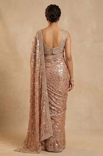 Peach embroidered georgette saree with unstitched blouse